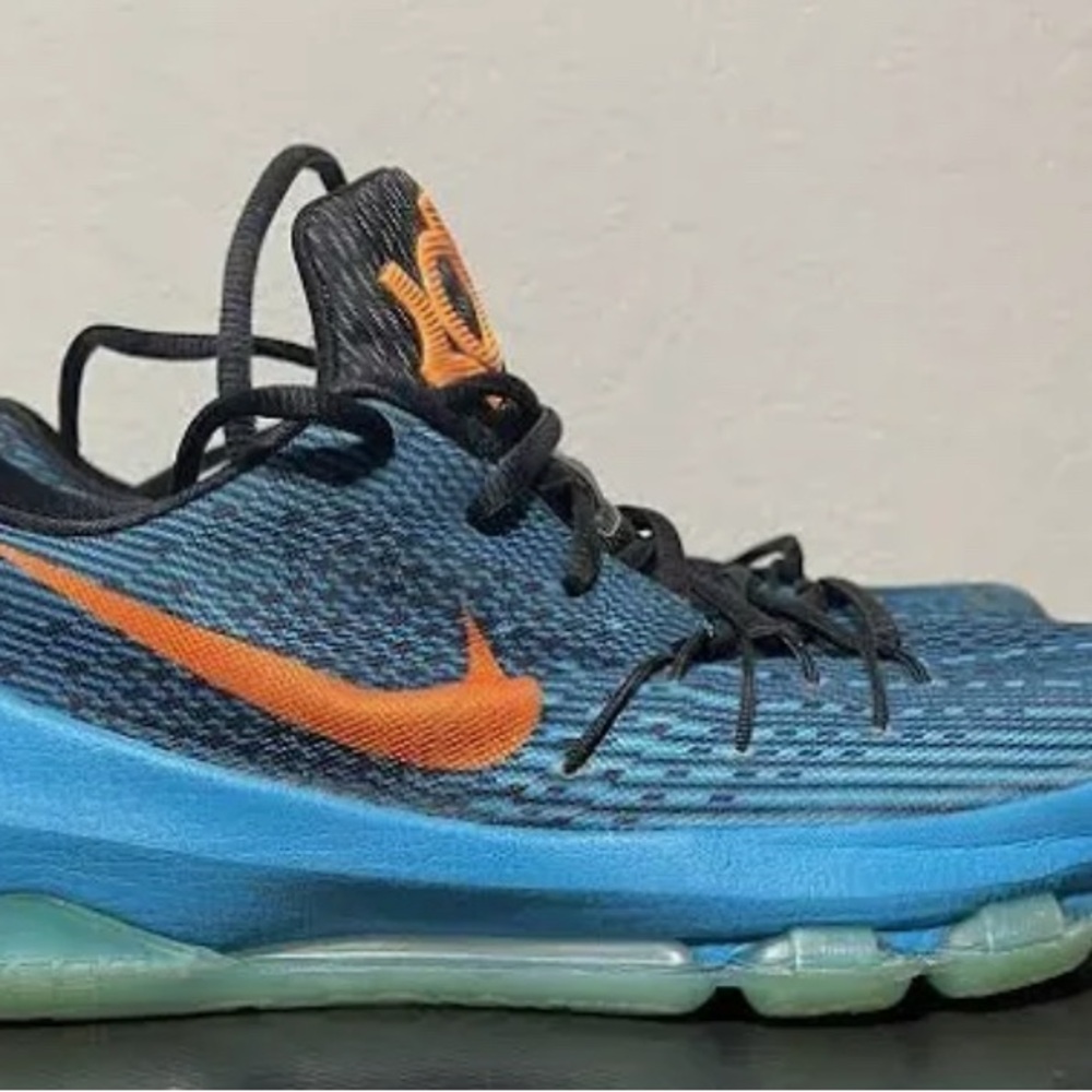 Nike KD 8 Road Game
Good condition. Creased in front. 
Size 7Y